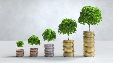 Stacks of coins arranged in a bar graph, Saving money concept. 3D illustration